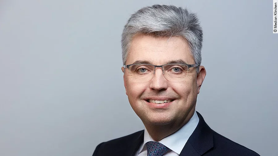 Dr. André M. Schmidt Dr. André M. Schmidt