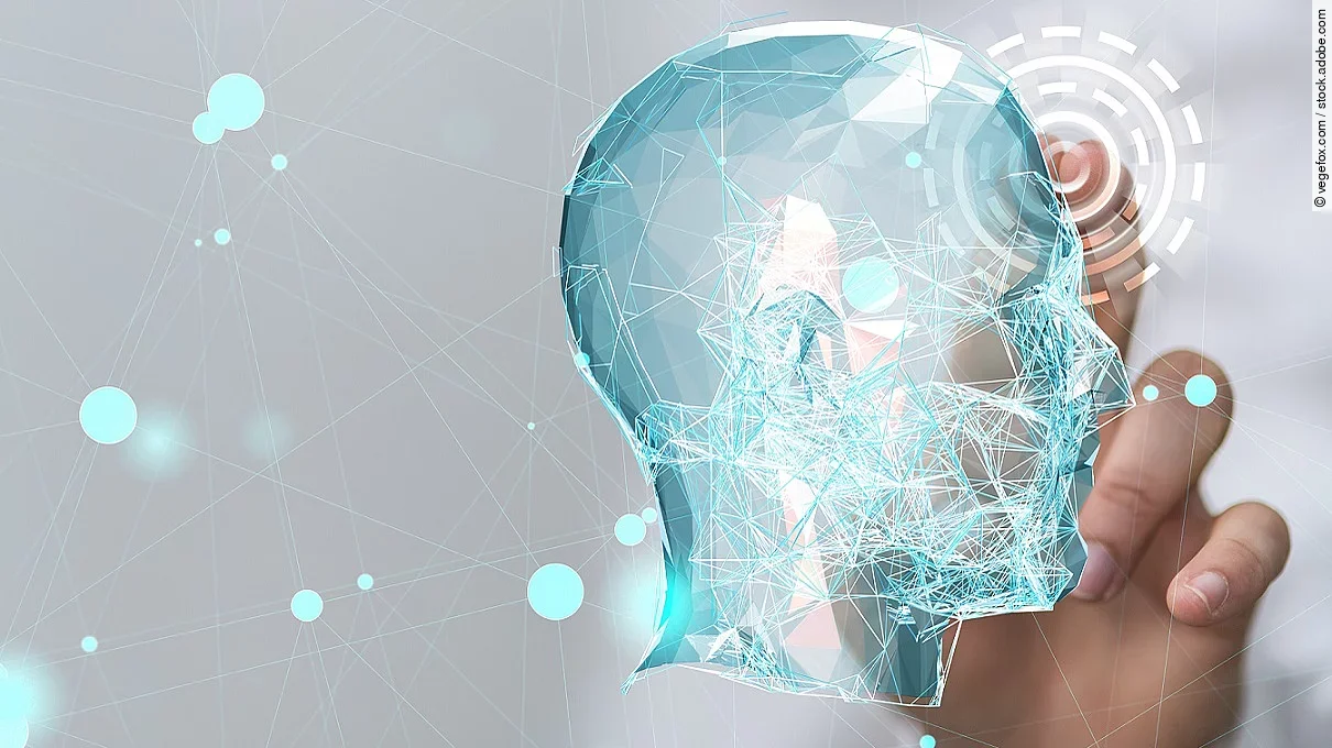Virtuelle Kopf-Silhouette umgeben von einem Datennetz.