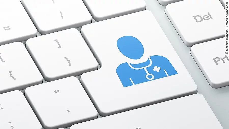 Weße Tastatur. Auf der "Enter"-Tase ist ein Icon in Form eines Arztes abgebildet.