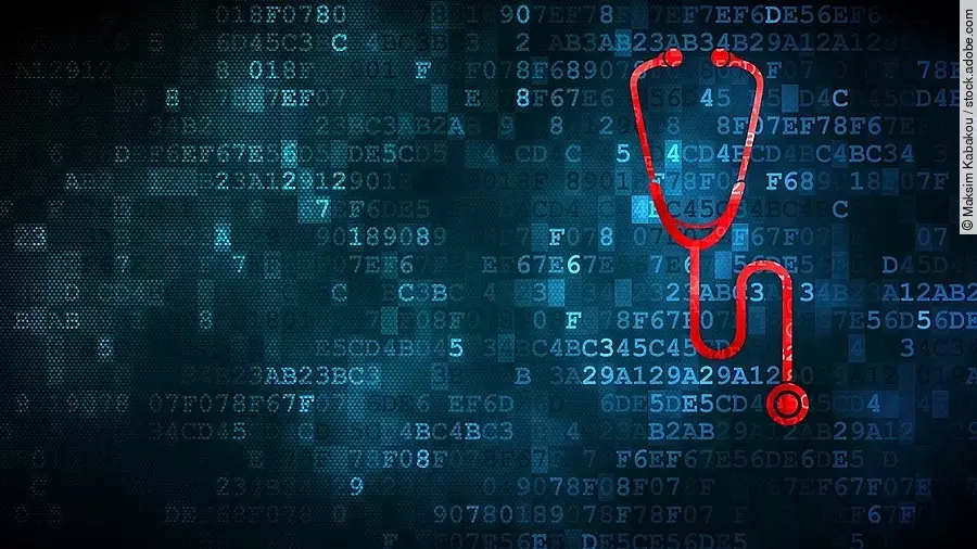 Vor einem dunkelblauen Hintergrund aus Daten in Form von Zahlen und Buchstaben, ist ein rotes Stethoskop.