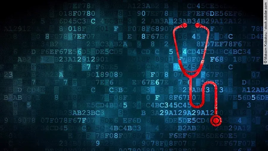 Vor einem dunkelblauen Hintergrund aus Daten in Form von Zahlen und Buchstaben, ist ein rotes Stethoskop.