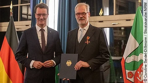 Prof. Dr. Dr. Frank Schneider und Hendrik Wüst