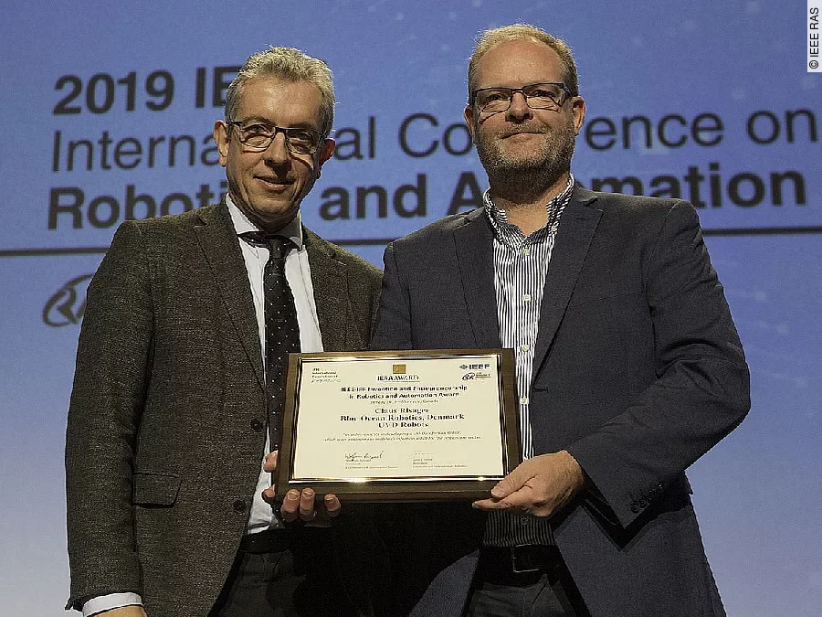 Wolfram Burgard, President IEEE RAS und Claus Risager, CEO Blue Ocean Robotics