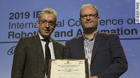 Wolfram Burgard, President IEEE RAS und Claus Risager, CEO Blue Ocean Robotics