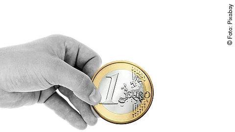 Hand mit Euromünze Hand mit Euromünze