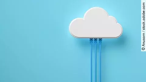 Cloud Lampe in Form einer Wolke vor blauem Hintergrund.