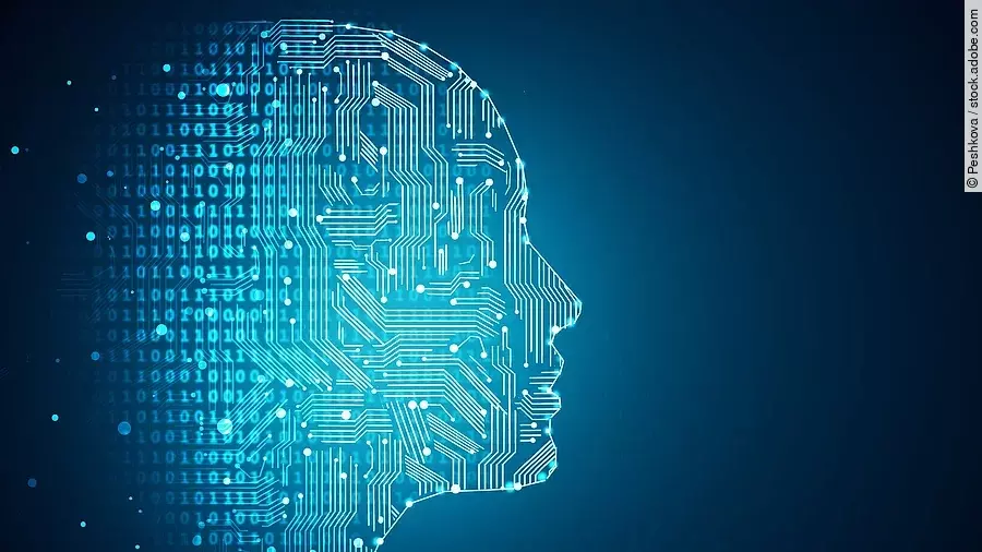 Darstellung Künstlicher Intelligenz durch die Umrisse eines menschlichen Profils. Die Haut besteht aus Netzwerkdiagrammen und binären Codes.