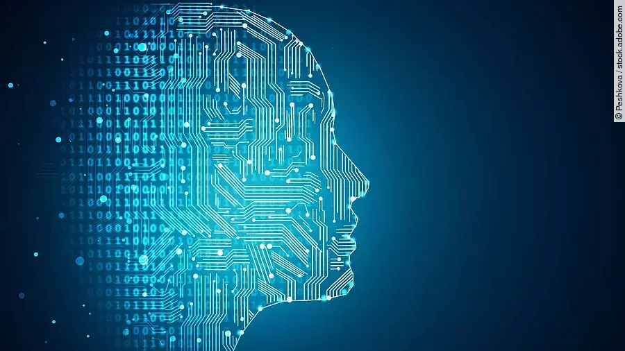 Künstliche Intelligenz Darstellung Künstlicher Intelligenz durch die Umrisse eines menschlichen Profils. Die Haut besteht aus Netzwerkdiagrammen und binären Codes.