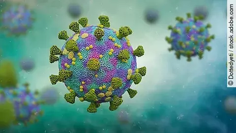 Mehrere Viren schweben umher. 