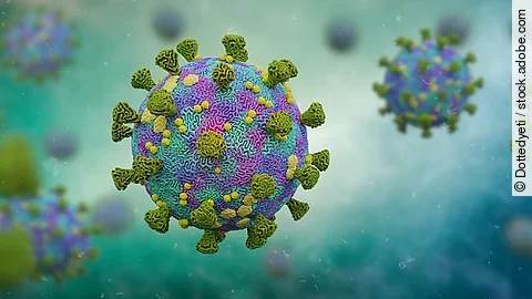 Mehrere Viren schweben umher. 