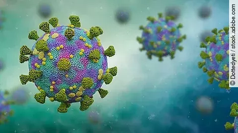 Mehrere Viren schweben umher. 