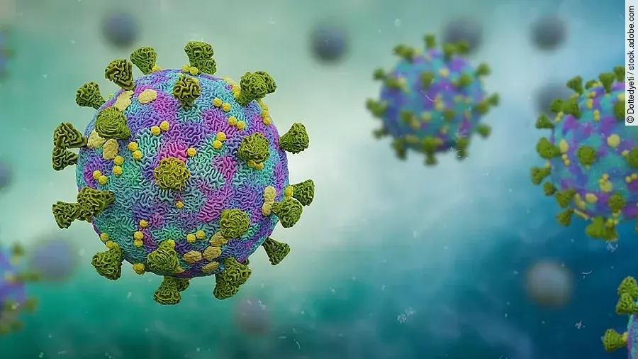 Mehrere Viren schweben umher. 