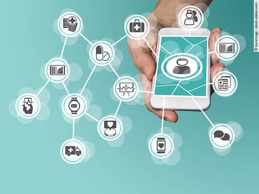 Aus einem Smartphone kommt ein graphisches Netzwerk, das verschiedene Bereiche des Gesundheitswesens zeit: Medikamente, Krankenwagen, Pflege, Dokumente, Arztkoffer und weitere.