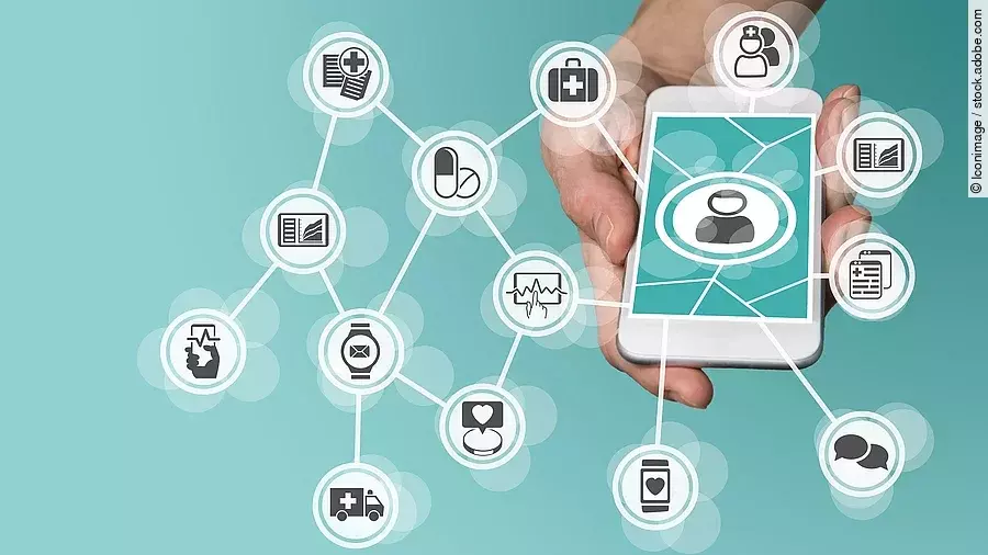 Aus einem Smartphone kommt ein graphisches Netzwerk, das verschiedene Bereiche des Gesundheitswesens zeit: Medikamente, Krankenwagen, Pflege, Dokumente, Arztkoffer und weitere.