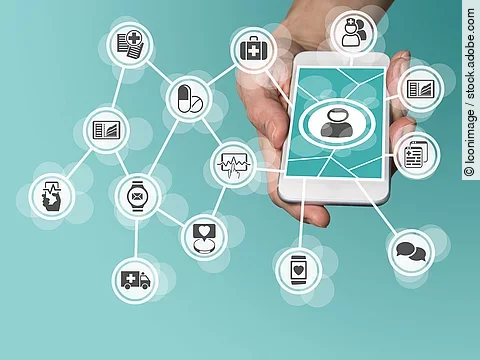 Aus einem Smartphone kommt ein graphisches Netzwerk, das verschiedene Bereiche des Gesundheitswesens zeit: Medikamente, Krankenwagen, Pflege, Dokumente, Arztkoffer und weitere.