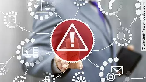 Von einem roten Dreieck mit Ausrufezeichen gehen weitere weiße Symbole aus: ein Fragezeichen, eine Lupe, ein Brief mit @-Zeichen, eine Waage und mehr. Im Hintergrund ist ein Geschäftsmann im Anzug zu sehen.