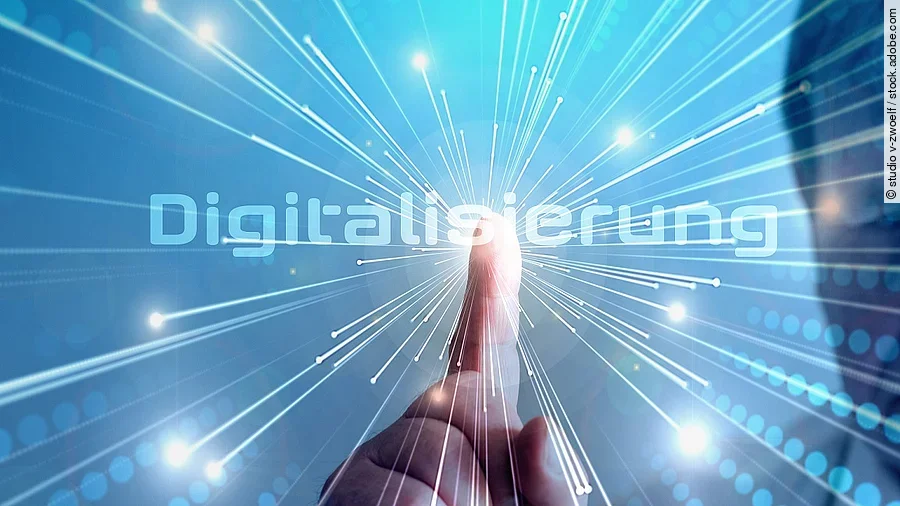 Digitalisierung Grafik mit dem Wort "Digitalisierung" im Mittelpunkt. Lichtstrahlen gehen vom Mittelpunkt aus.