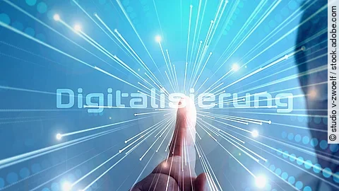 Grafik mit dem Wort "Digitalisierung" im Mittelpunkt. Lichtstrahlen gehen vom Mittelpunkt aus.