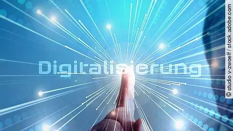 Grafik mit dem Wort "Digitalisierung" im Mittelpunkt. Lichtstrahlen gehen vom Mittelpunkt aus.