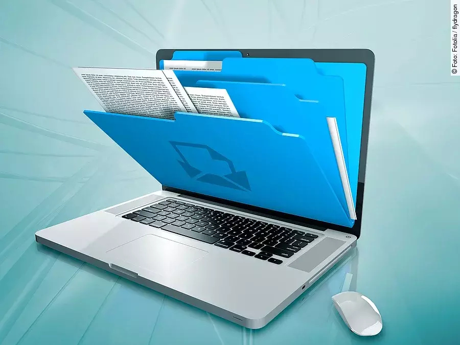 laptop with folders on the screen