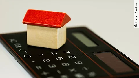 Taschenrechner Taschenrechner mit Holzhaus