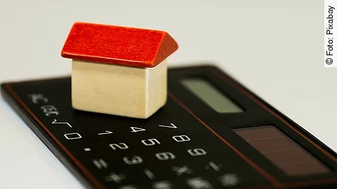 Taschenrechner Taschenrechner mit Holzhaus