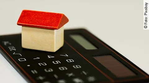 Taschenrechner Taschenrechner mit Holzhaus