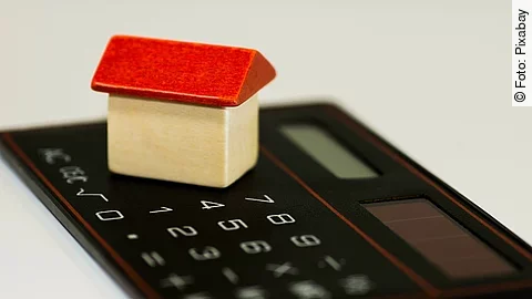 Taschenrechner Taschenrechner mit Holzhaus